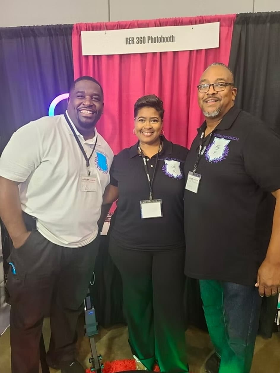 The R.E.R. 360 Photo Booth team at an event expo.